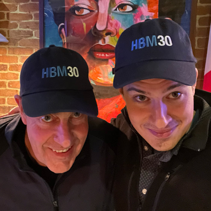 Mike and Cole Davis wearing HBM30 hats